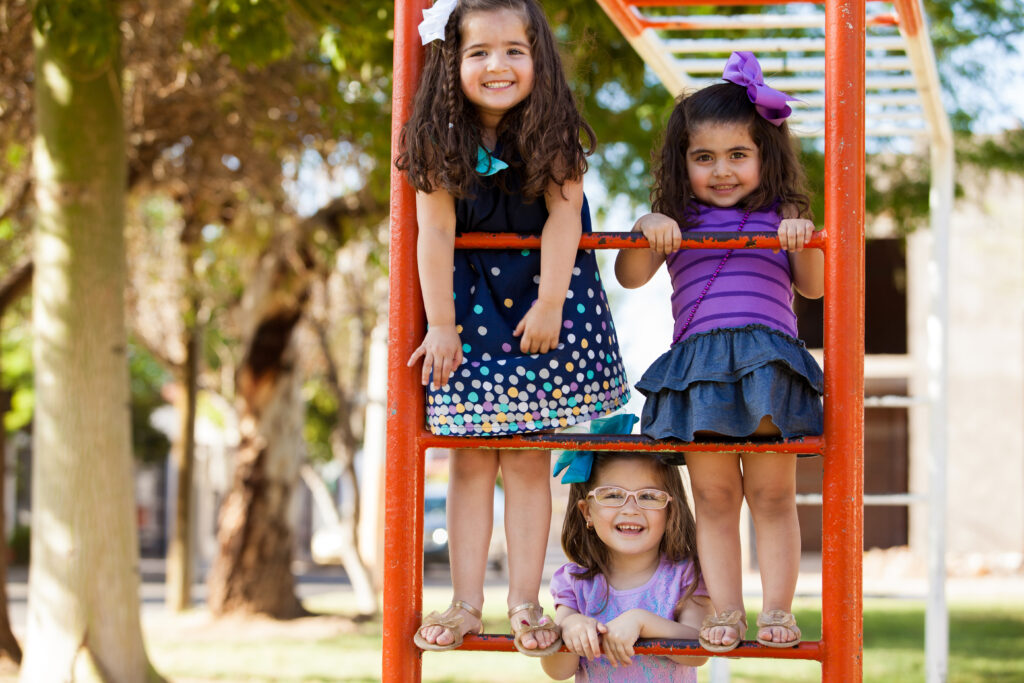 little girls playing at the playground