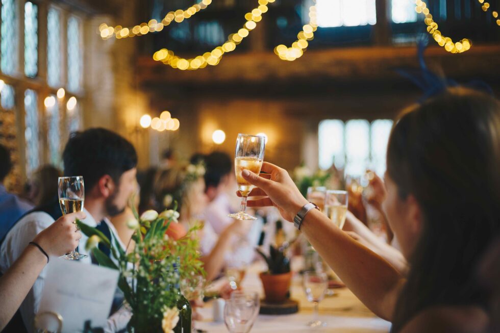 event guests drinking wine