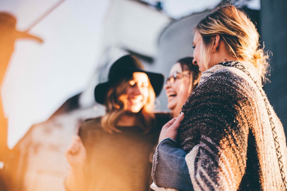 family and friends laughing together