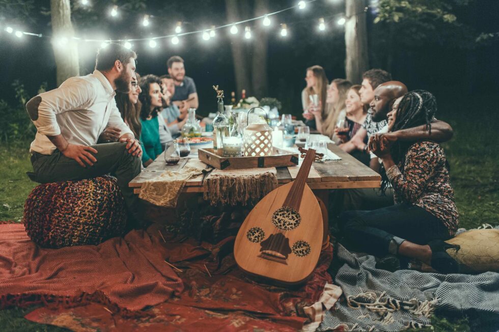 friends gathering for dinner at night