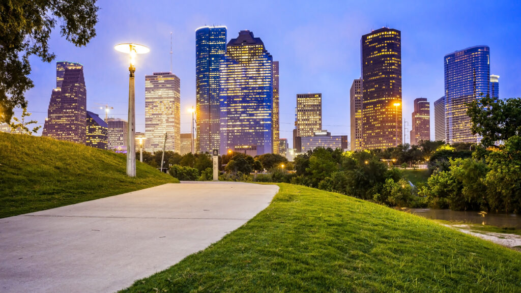 Houston city skyline as night falls and Eleanor Tinsley Park