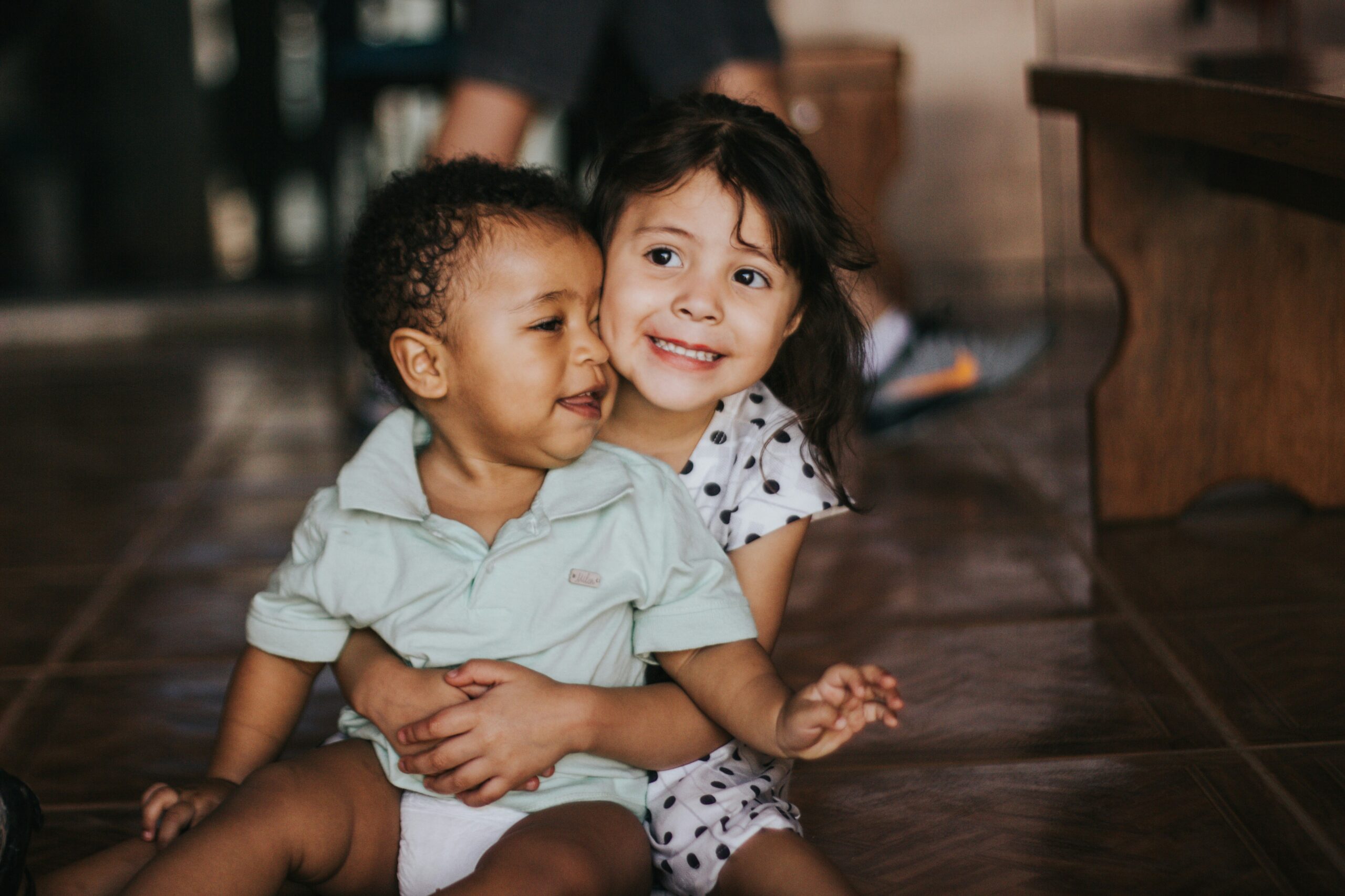 two kids smiling and happy