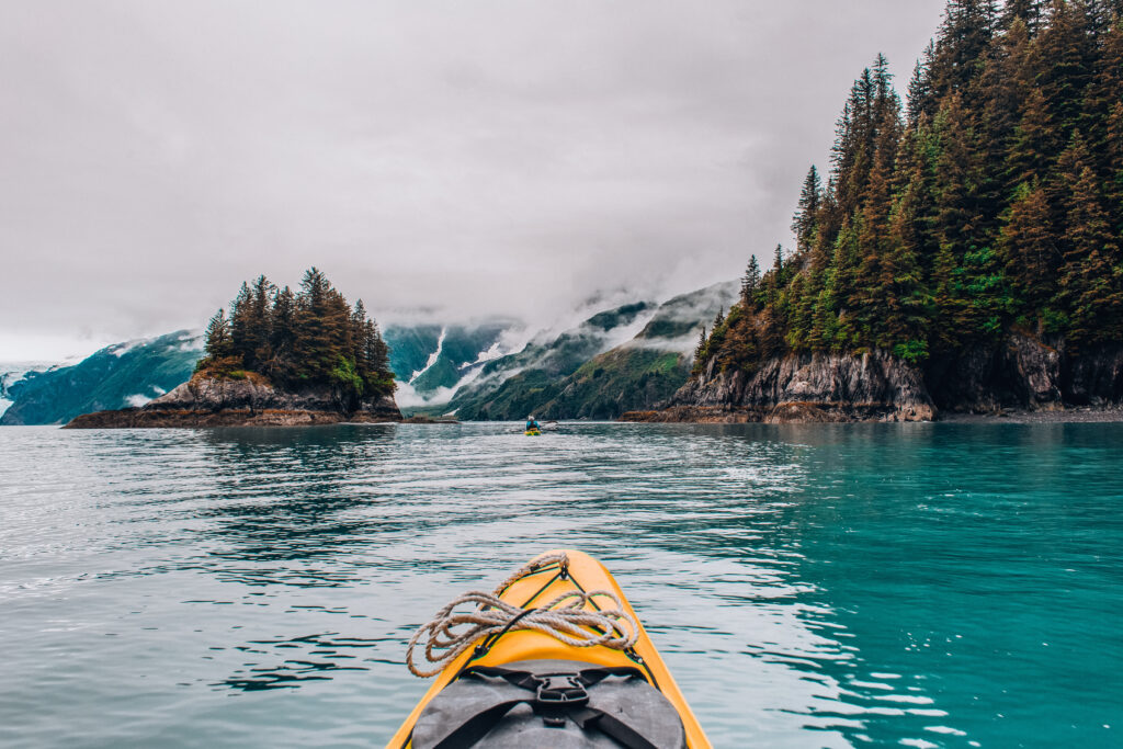 Kayaking through glacial waters in Alaska travel stories